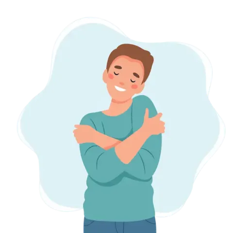 young boy hugging himself